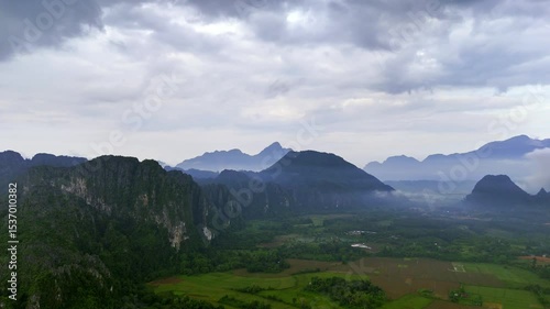 4k Video shot aerial view by drone. mountain at the village of Vang Vieng on Laos.