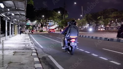 Wallpaper Mural Night time Motorcycle Ride, Urban Street, Cityscape, Action Shot, Street Environment, Rider Viewpoint, Adventure Concept Torontodigital.ca