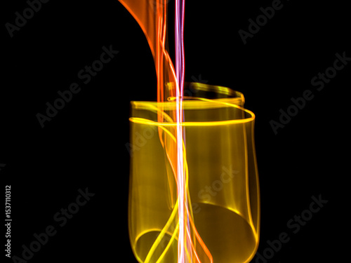 colorful light trails in dark background. Abstract light routes that rotate in vibrant colors. Forestry of the blurry movement of light painting. Blurred lights at night. Intentional camera movement,	