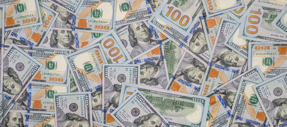 Obraz premium pile of american dollar paper money background