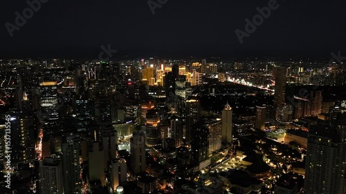 Wallpaper Mural A bustling urban scene from Makati City, the financial heart of Metro Manila, Philippines, showcasing modern skyscrapers and city life.

 Torontodigital.ca