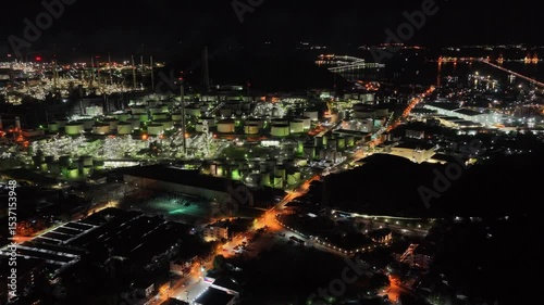 Aerial view footage B roll light oil terminal is industrial facility for storage of oil and petrochemical. oil manufacturing products. power electric plant, low light. Footage b roll drone shot.