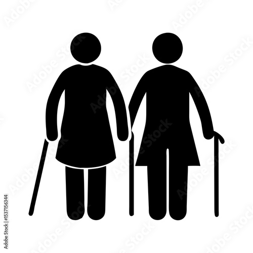 Two elderly women walking with canes silhouette