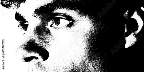 Dramatic high contrast portrait of man in black and white