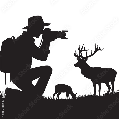 Silhouette of Wildlife Photographer Taking Pictures of Deer Family