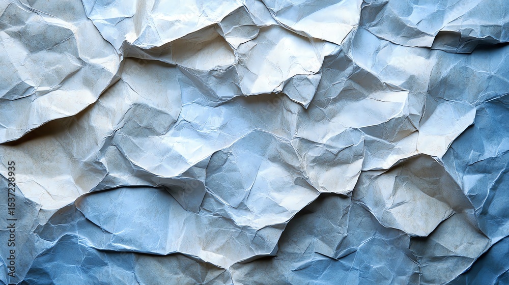 Fototapeta premium Crumpled Paper Texture: Blue and White Abstract Background