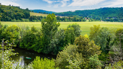Vezere Valley in Peyzac-le-Moustier, Dordogne, Perigord, France, bucolic countryside landscape crossed by a river, summer walk and canoeing on the river Vezere