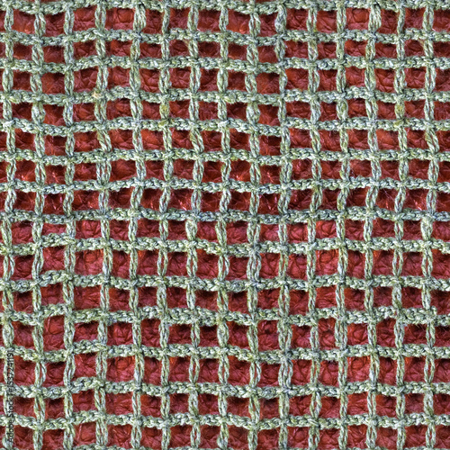 Seamless 4k photo texture material of cloth dense rope braided net mesh on brown leather surface.