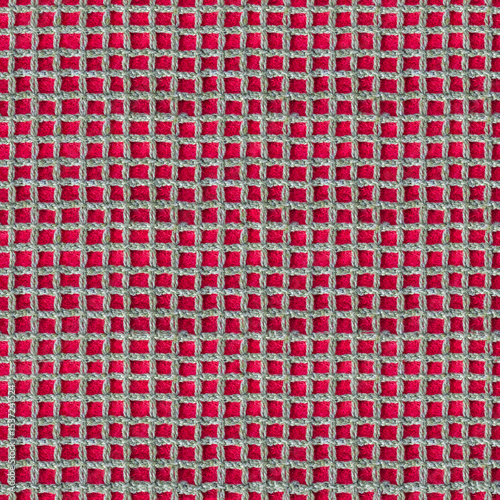 Seamless 4k photo texture material of cloth dense rope braided net mesh on red suede leather surface.
