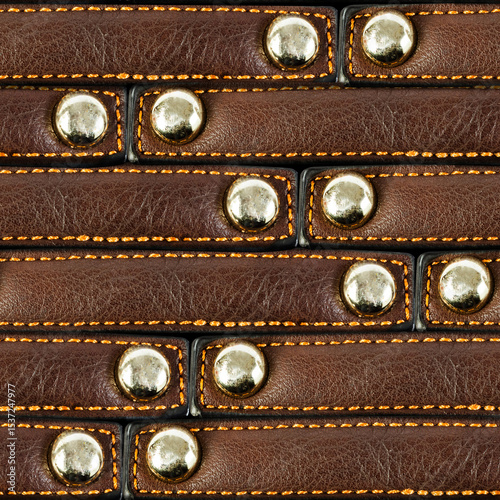 Seamless 4k photo texture material of brown leather riveted straps surface.