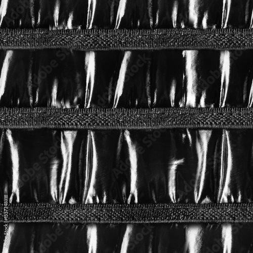 Seamless 4k photo texture material of patent black leather surface with cloth srtraps.