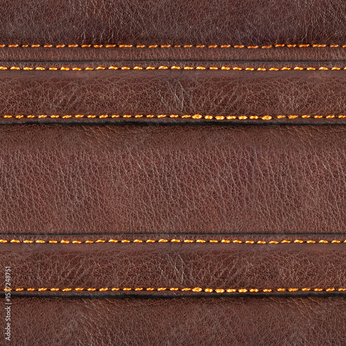 Seamless 4k photo texture material of brown leather surface with stitched straps.