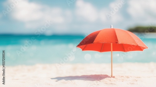 Wallpaper Mural Bright red umbrella on sandy beach with clear blue sea in the background Torontodigital.ca