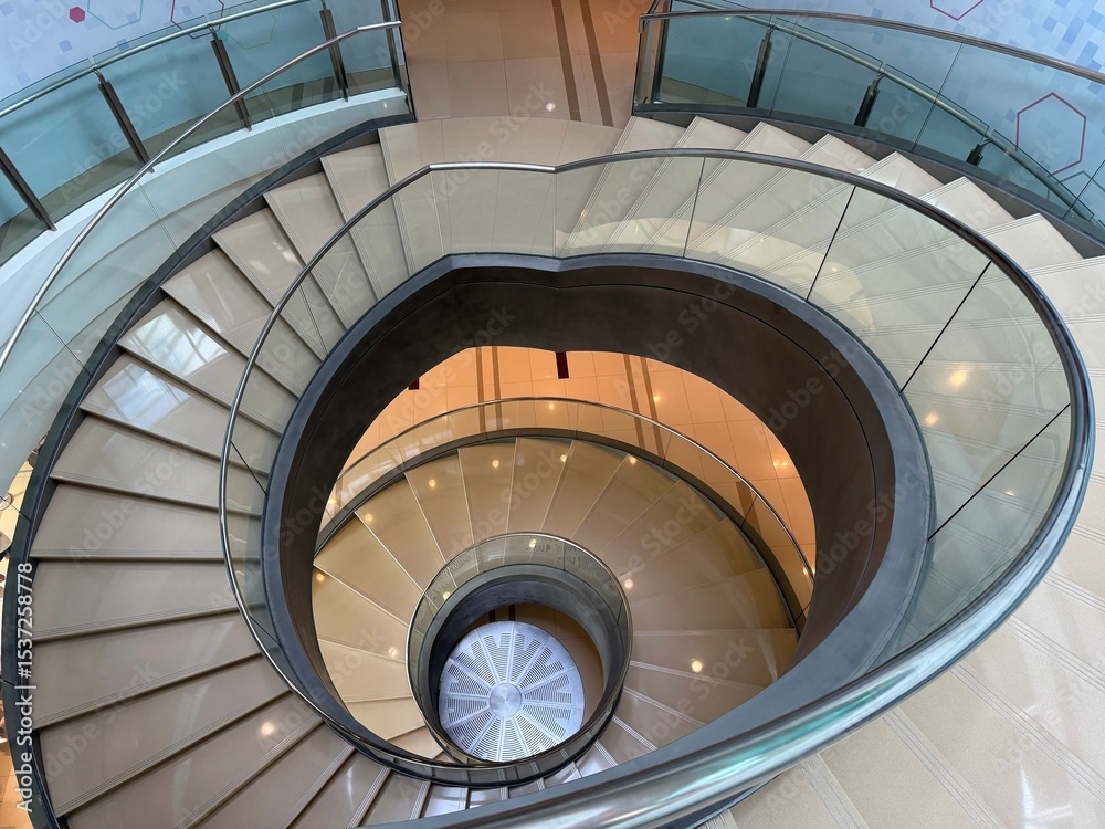 Fototapeta premium The Iconic Nautilus Staircase – A Symbol of Curiosity and Knowledge at Bank Negara Malaysia Museum