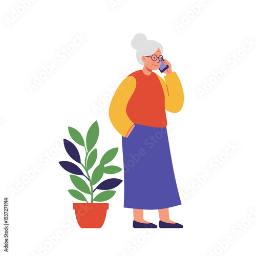 Elderly woman talking on smartphone while standing by potted plant  