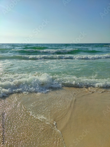 Fototapeta Naklejka Na Ścianę i Meble -  Sunny Beach Scene with Sand and Clear Sky