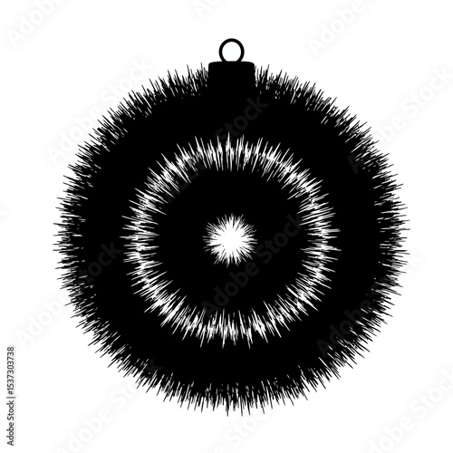 A fuzzy christmas ornament in black and white design silhouette