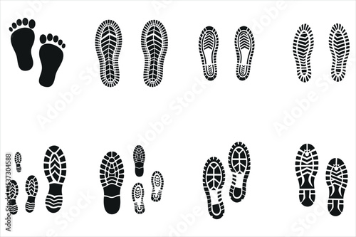 Diverse Shoe and Foot Prints on a White Background