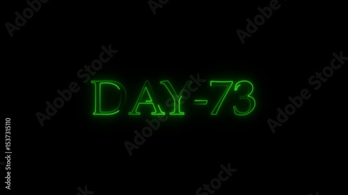 Green neon text day 73 appearing on black background for digital countdown concepts