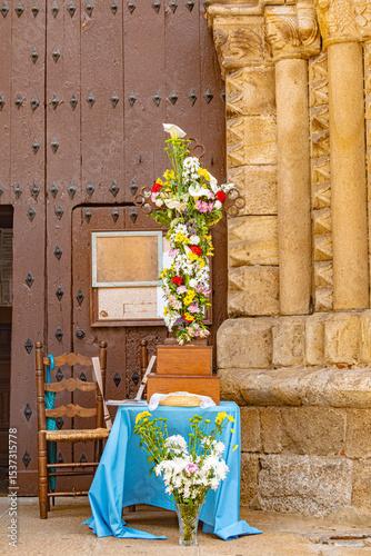 Altar with a May cross at the entrance of a church