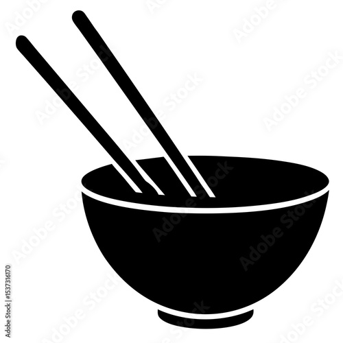chopsticks and bowl on black background