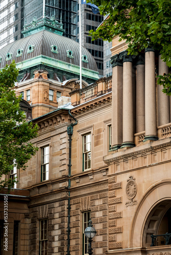 An isolated view of classic architecture in downtown Sydney, Australia with columns and a bronze roof_20211217_04972.