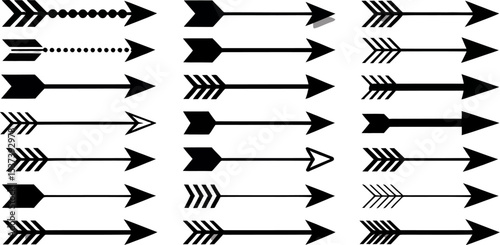 An array of black arrow illustrations with varying designs arranged on a white background surface