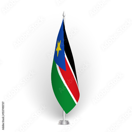 South Sudan flag - 3D standard conference flag hanging on ground flagpole. Usable for summit, indoor meeting, board room, government office, press room or reception. Vector flag with shading