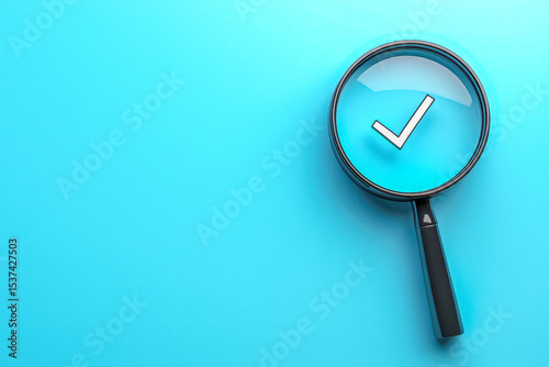 Magnifying glass with a checkmark symbol on a blue background