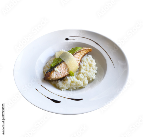 Grilled salmon and risotto on a white plate