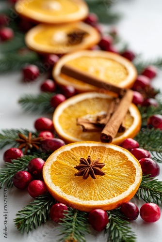 Decorative Arrangement of Orange Slices and Spices for Festive Winter Celebra...