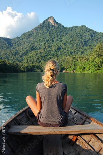 Relaxation on a Tranquil Lake With Mountain Backdrop at Sunset