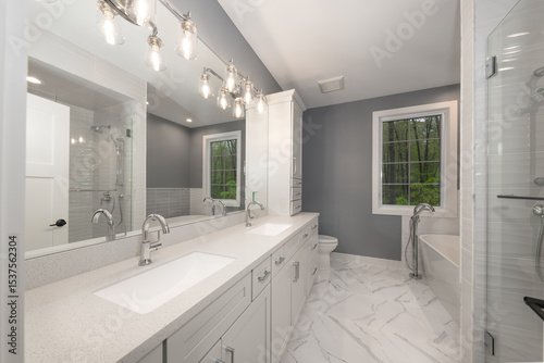 bathroom has been updated with a new vanity new tile and new fixtures installed by a professional