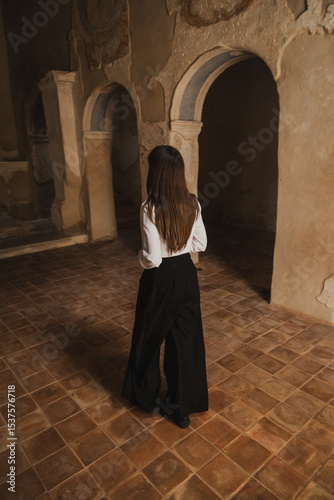 Woman Entering And Walking Inside The Small Old Church 