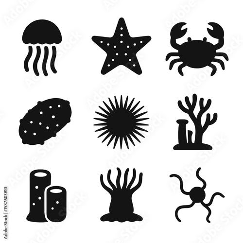 Aquatic Invertebrate Icons. Solid, filled icons set of aquatic invertebrates: jellyfish, starfish, crab, sea