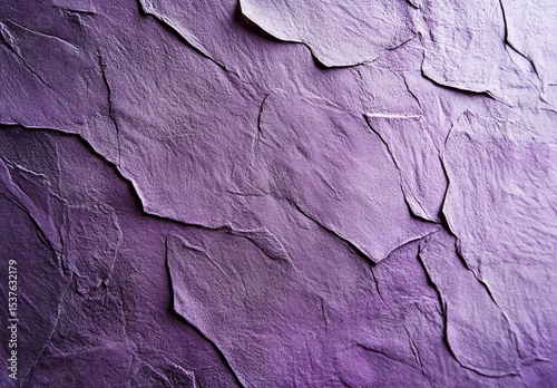 A close-up of textured paper in shades of purple