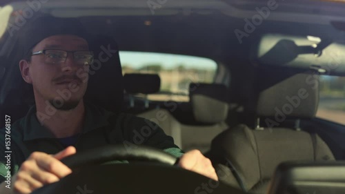Young Man Driving Car and Arguing in Parking Lot