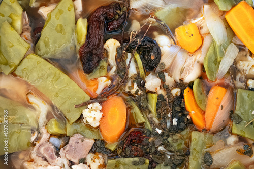 Pickled pig's feet with nopales and vegetables prepared for a traditional Mexican dish