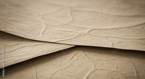 Textured beige paper sheets