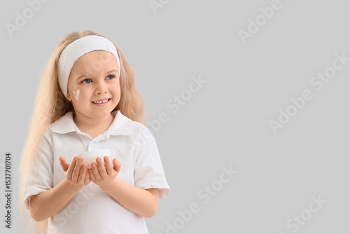 Cute little happy girl with...