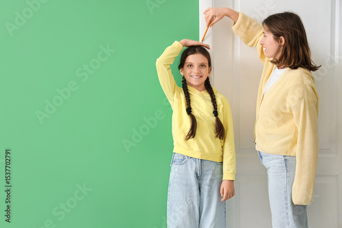 Cute girl with her mother m...