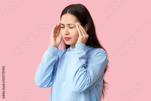 Young Asian woman suffering...