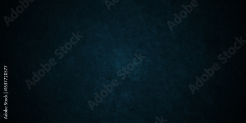Dark Blue background with grunge backdrop texture, watercolor painted mottled blue background, colorful bright ink and watercolor textures on black paper background.