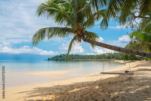 Beautiful tourist attractions Beach Koh Kood Island Thailand Trat, tropical beach with palm trees and a turqouse colored ocean on a sunny day, Ko Kut Island with coconut palm trees on the beach,Travel