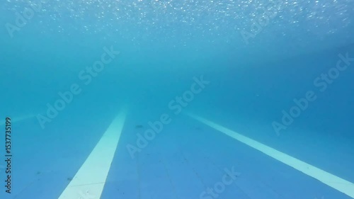 Raindrops falling in the swimming pool. Clean swimming pool.
