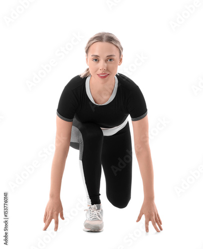 Sporty young woman preparin...