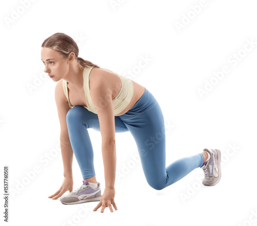 Young woman preparing to ru...