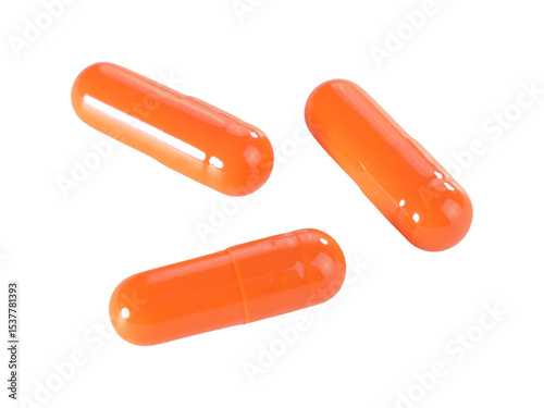 Bulk orange capsule pills isolated on white background.
