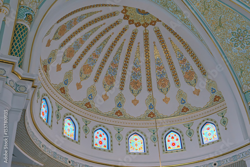  The mosque is decorated with colorful mosaics. Dome inside the mosque.