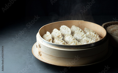 Dumplings in a bamboo steamer